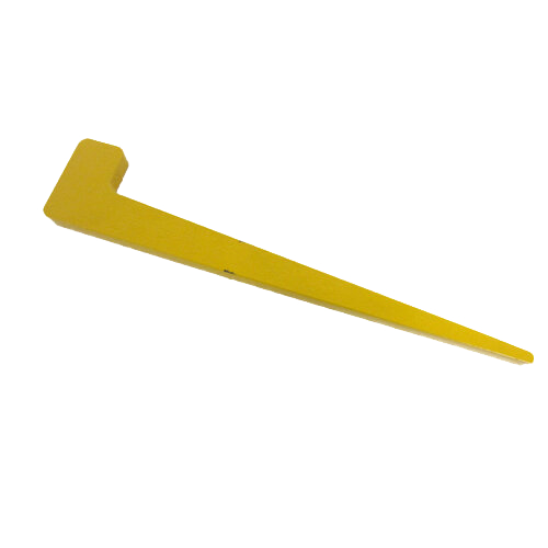 A yellow metal wedge used for a stretcher bar