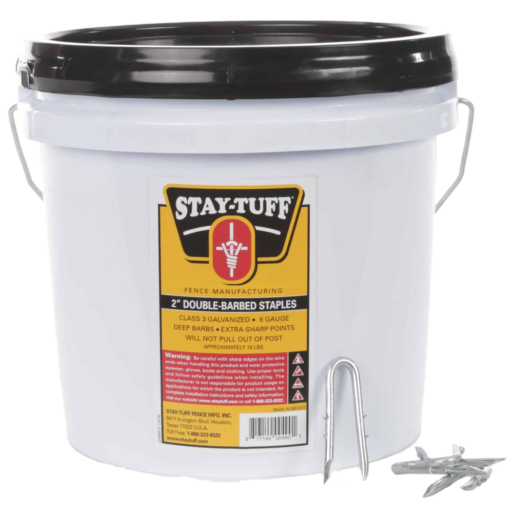 A white container with a black lid labeled 'STAY-TUFF' filled with barbed staples for fencing.